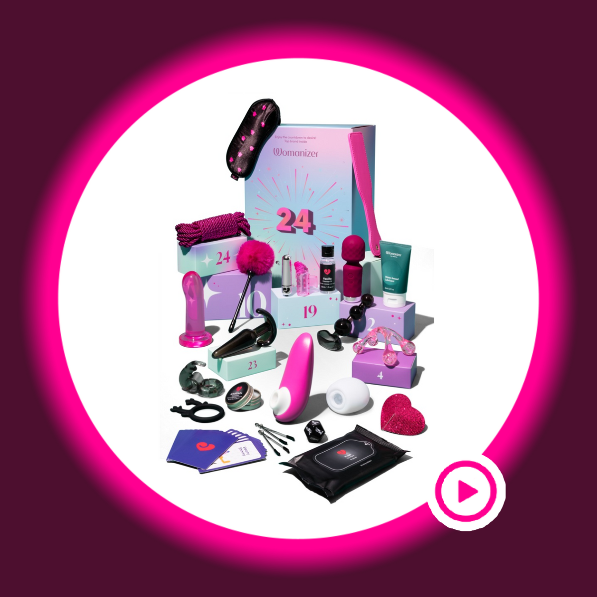 Magic Shiver Enjoy Erotik-Adventskalender 2026 mit ausgelegten Sextoys, Spielen, Pflegeprodukten und Accessoires vor pastellfarbenen Geschenkboxen