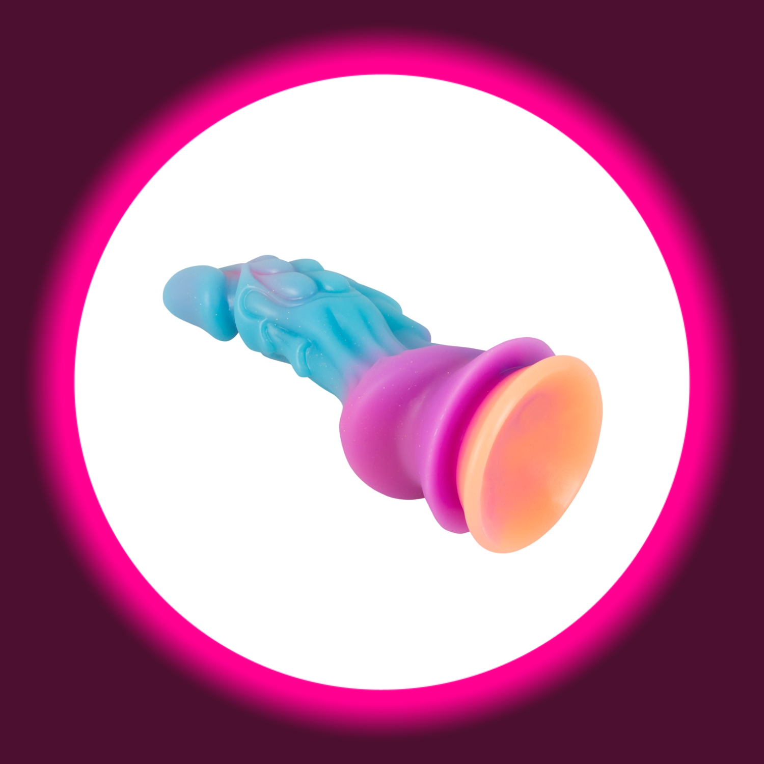 Leuchtender Mystic Dragon Dildo in Turkis und Pink mit Saugfuss, strukturiertem Design und Glitzereffekt - Beasty Cocks