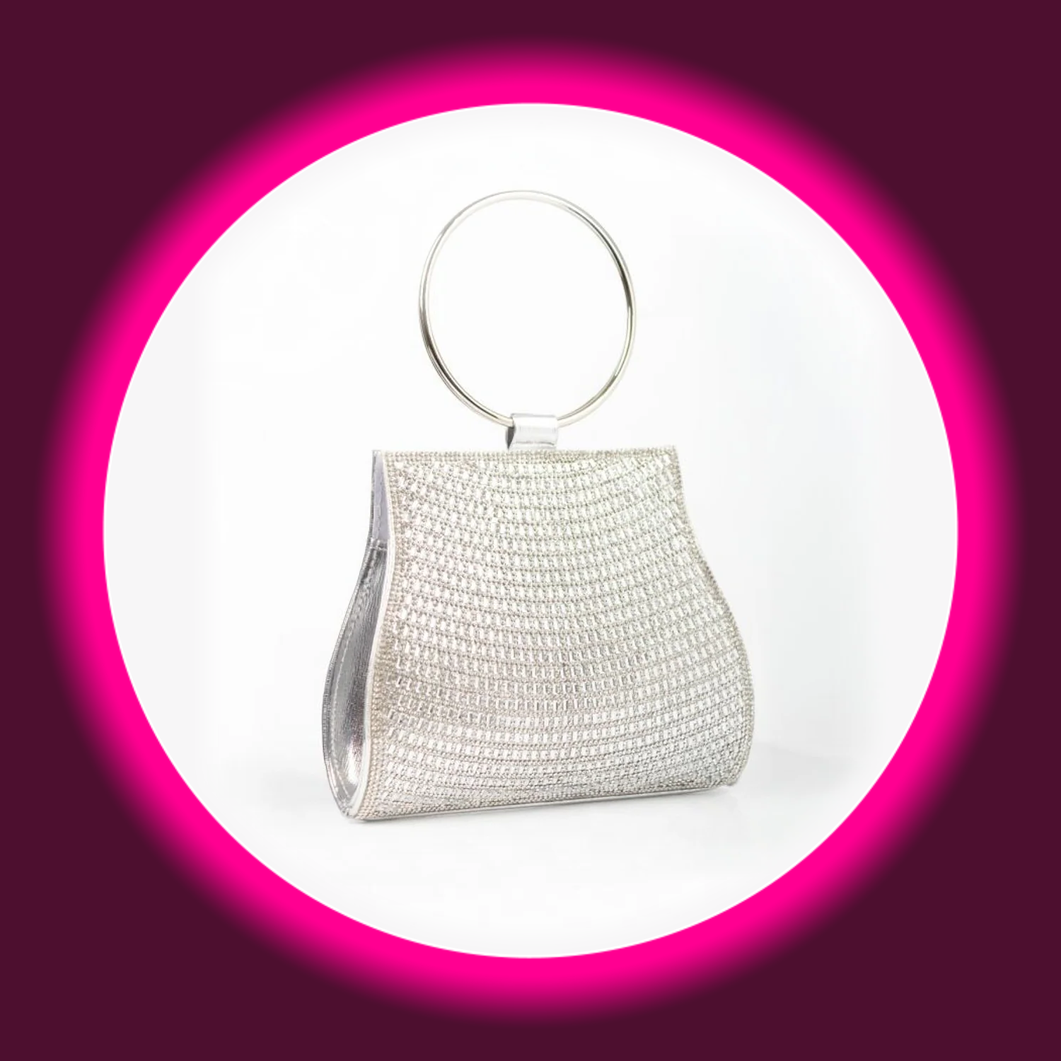 silberne Handtasche mit Strassverzierung und rundem Tragegriff, von Aftershock London