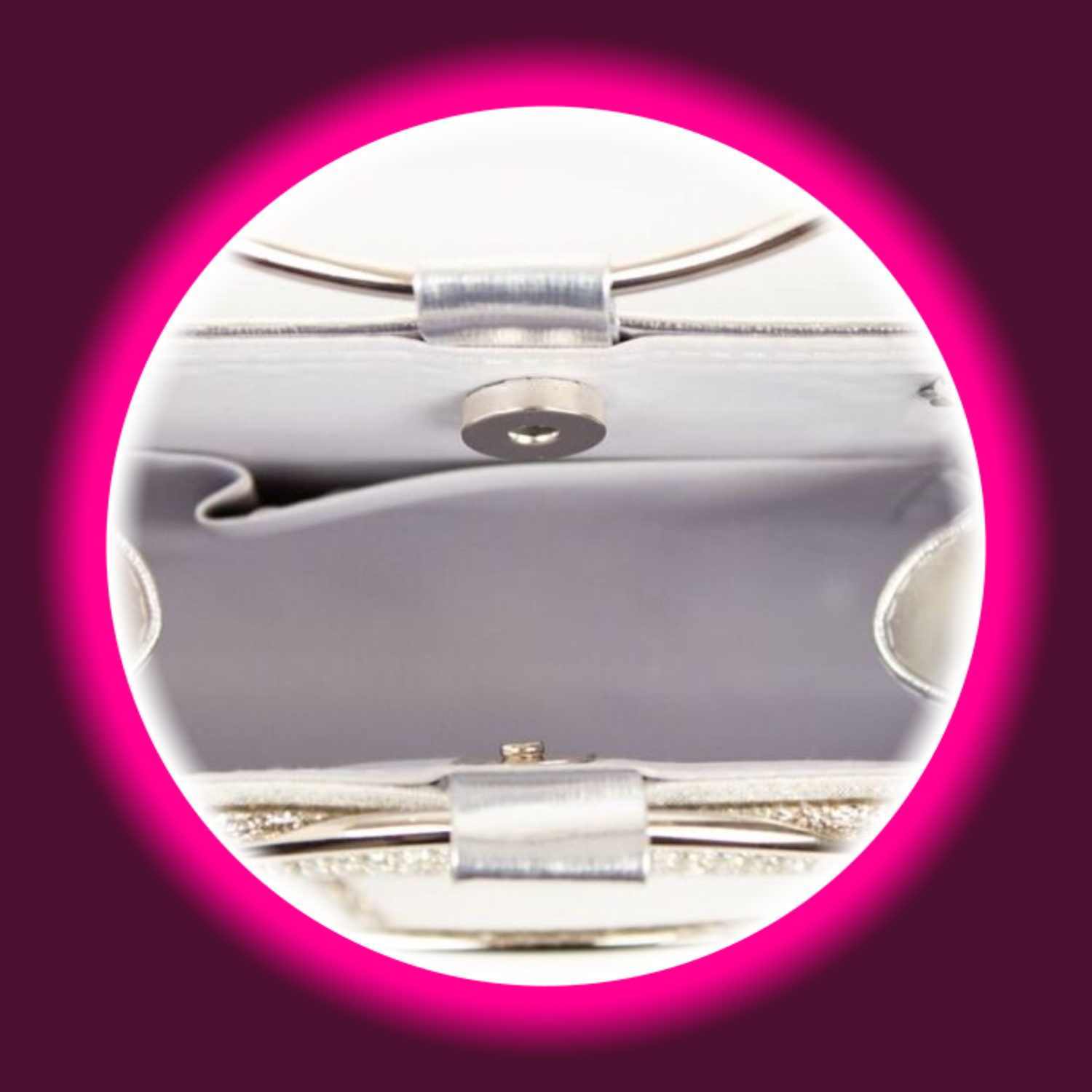 silberne Handtasche mit Druckknopfverschluss und rundem Tragegriff, von Aftershock London