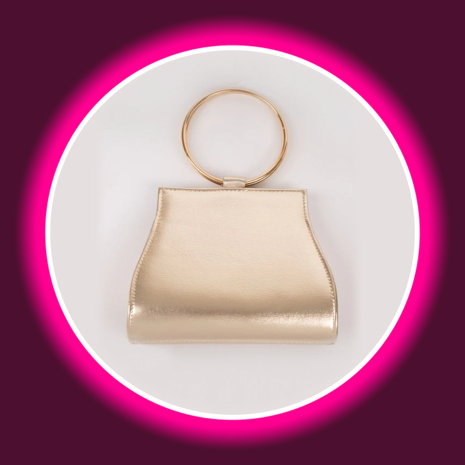 goldfarbene glänzende Handtasche mit rundem Tragegriff, von Aftershock London