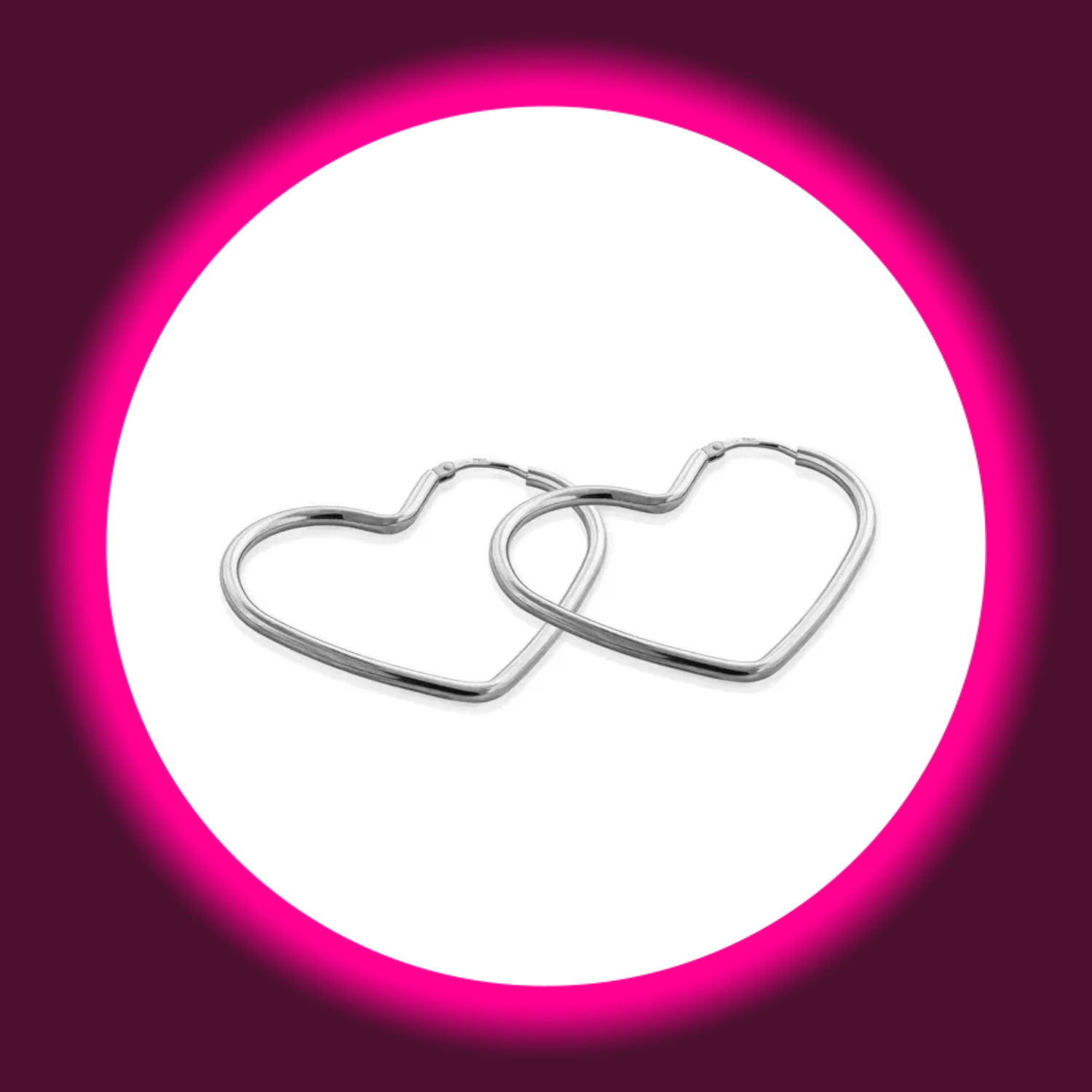 zwei silberne Creolen in Herzform von Modabilé