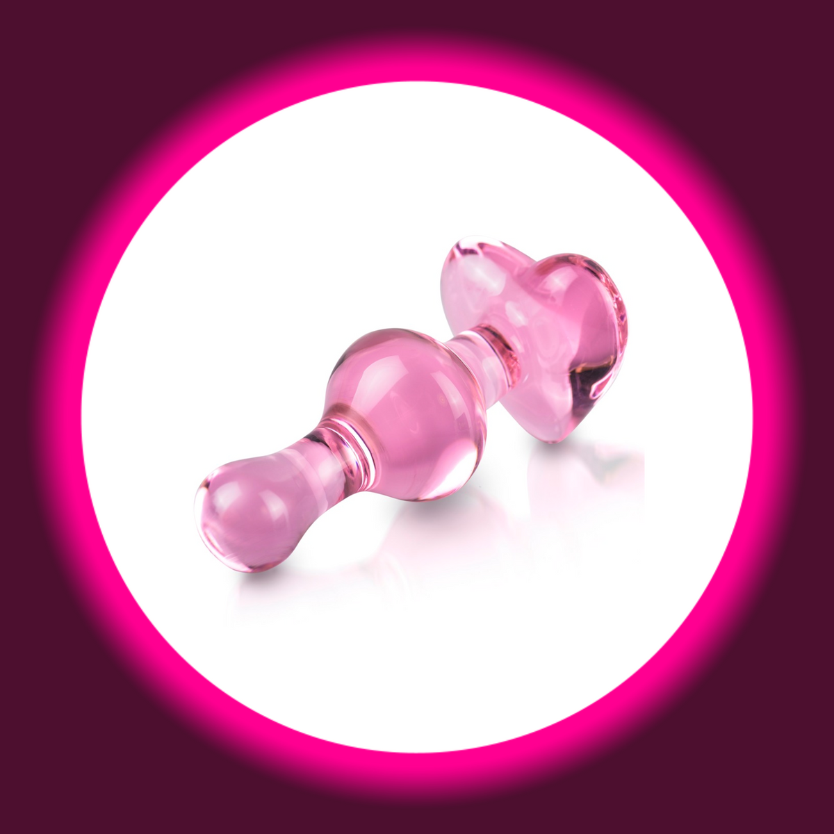 Pipedream Icicles No. 75 Glasplug in Rosa mit abgerundeter Spitze, kugelförmiger Verdickung und herzförmiger Basis, liegende Seitenansicht