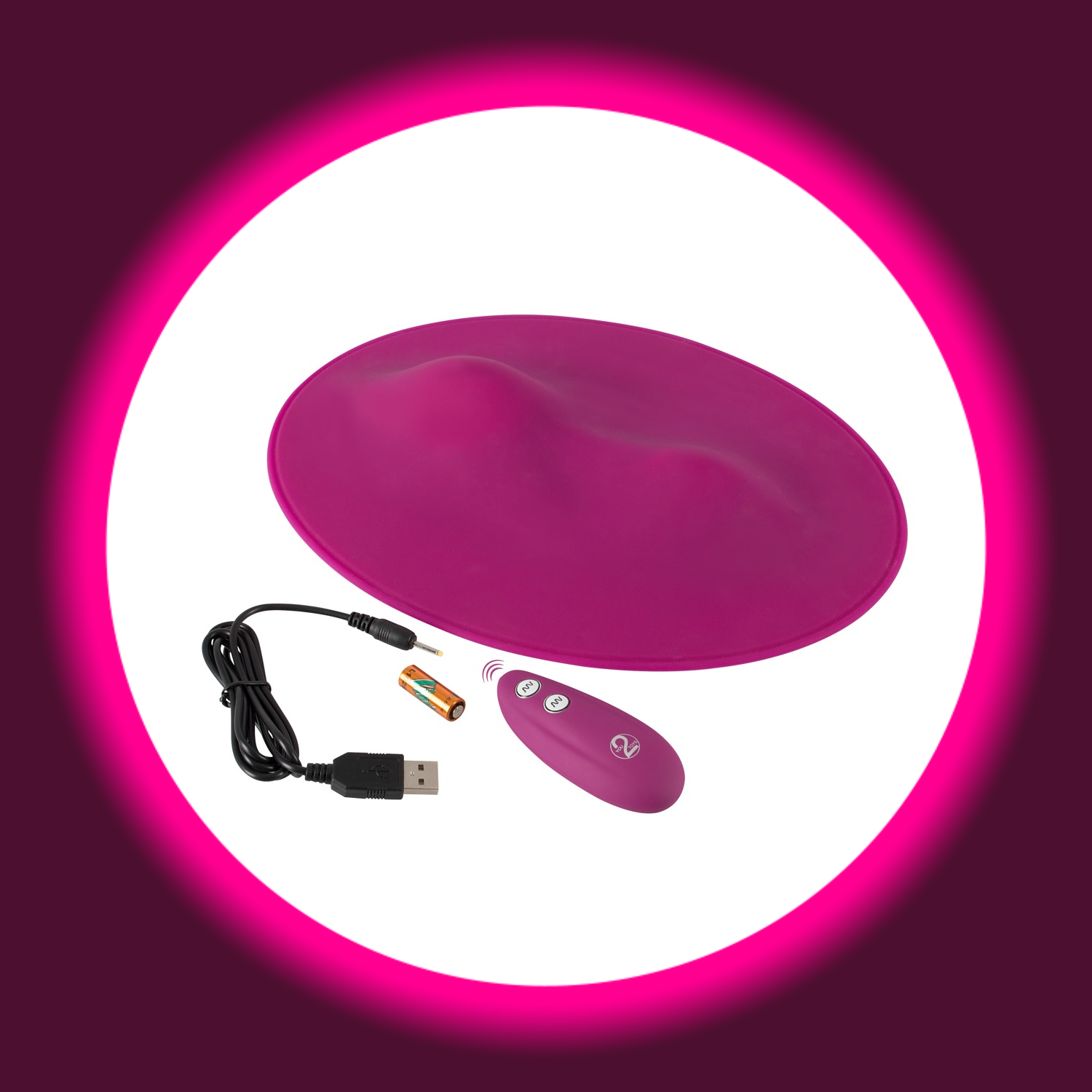 pinkes Vibrokissen Vibepad, daneben liegend ein USB-Ladekabel und die Fernbedienung mit Batterie