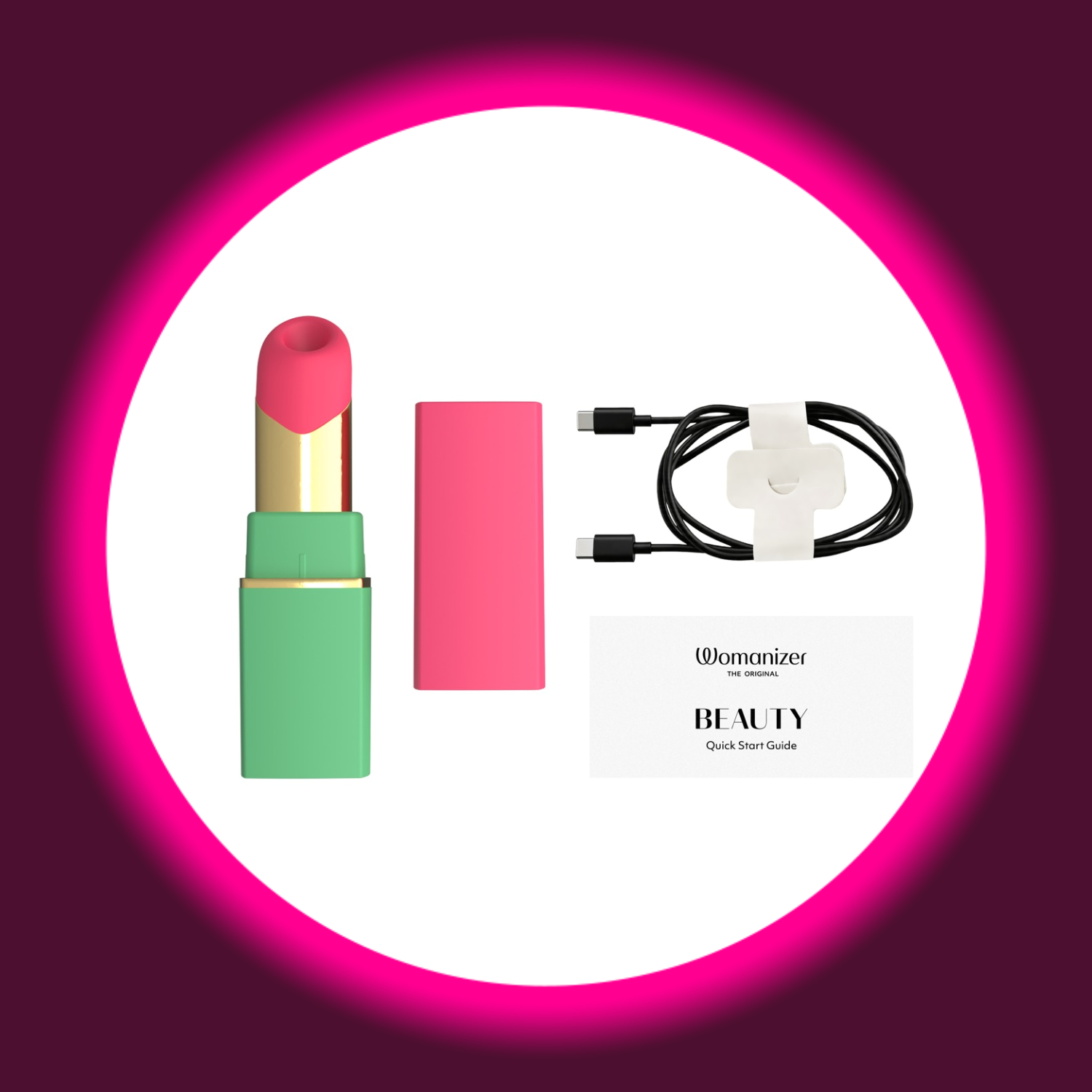 Frontansicht grüner Pulsator Beauty von Womanizer mit pinkem Aufsatz, Travel Cap und USB-Ladekabel