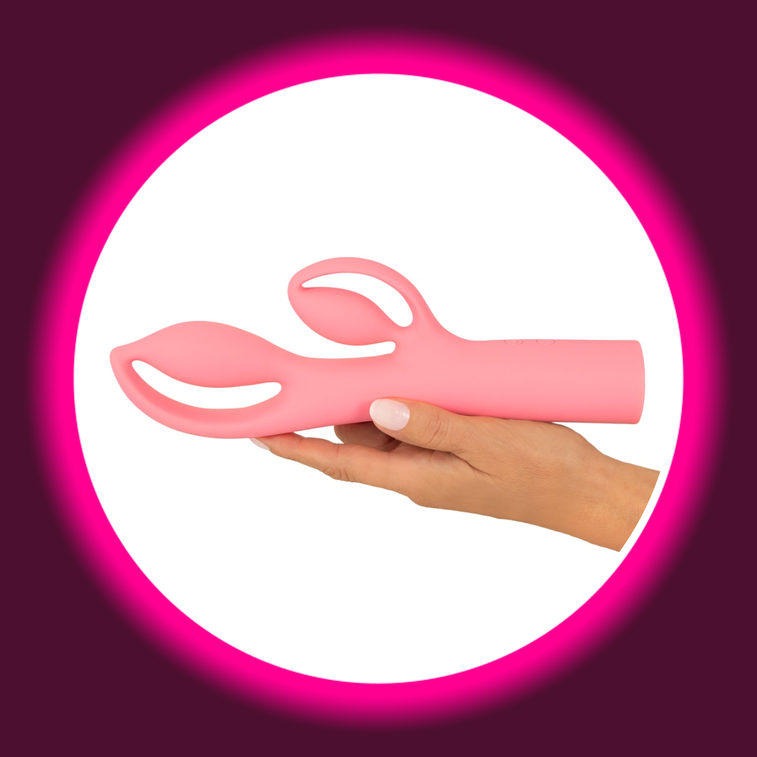 eine Hand hält einen pinken Rabbitvibrator Fabulous in extravagantem Design von You2Toys