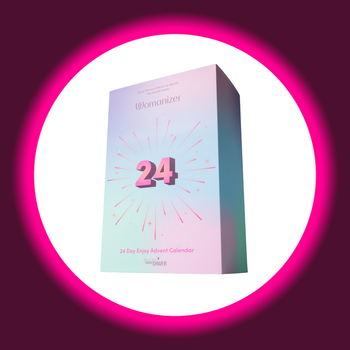 Magic Shiver Enjoy Erotik-Adventskalender 2026, geschlossene pastellfarbene Verpackung mit großer pinker 24, Strahlenmotiv und Womanizer-Schriftzug