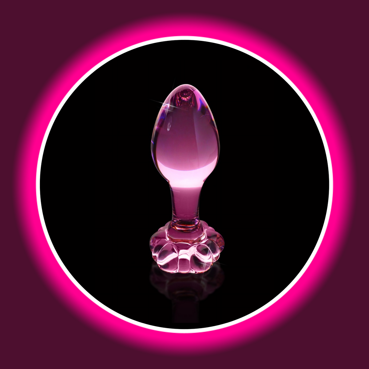 Pipedream Icicles No. 48 Glasplug in transparentem Rosa mit tropfenförmigem Kopf und schmalem Hals, aufrecht auf seiner blütenförmigen Basis