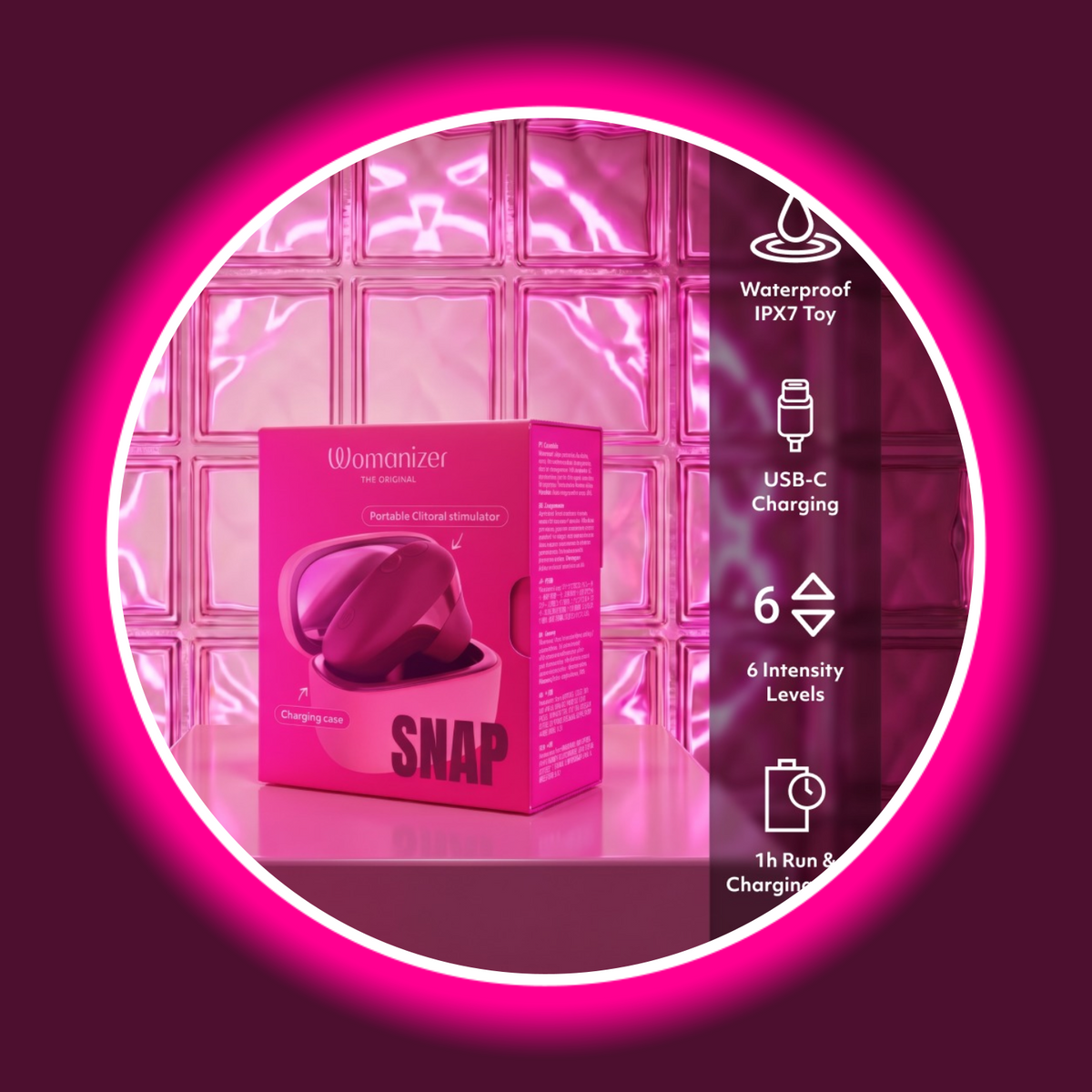 Womanizer Snap Produktverpackung mit technischen Daten – IPX7 wasserdicht, USB-C-Laden, 6 Intensitätsstufen und 1 Stunde Laufzeit
