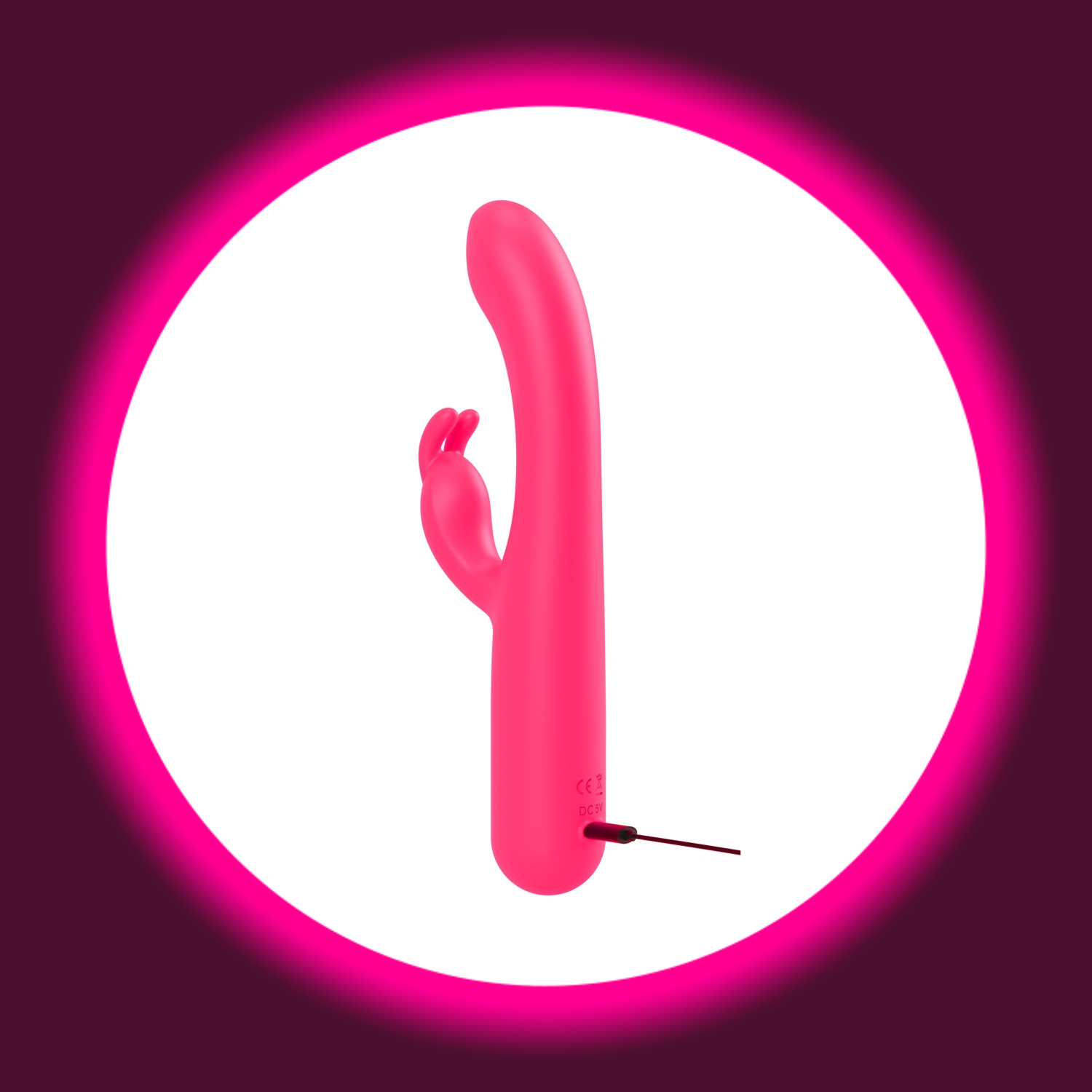 pinker Rabbitvibrator von You2Toys mit angeschlossenem USB-Ladekabel